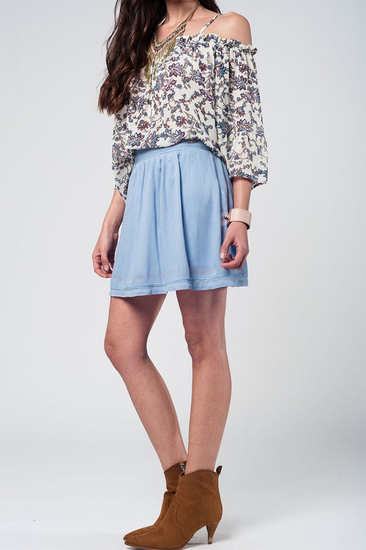 Q2 Gonna corta blu con Aztec ricamato