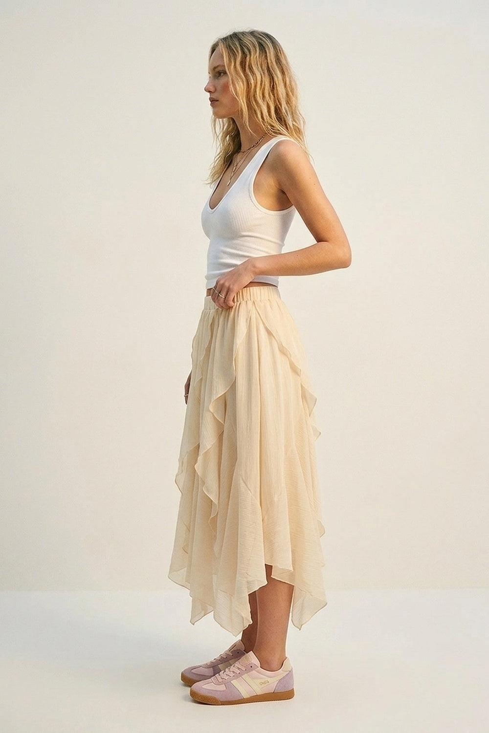 Gonna lunga asimmetrica in chiffon leggero con volant colore beige