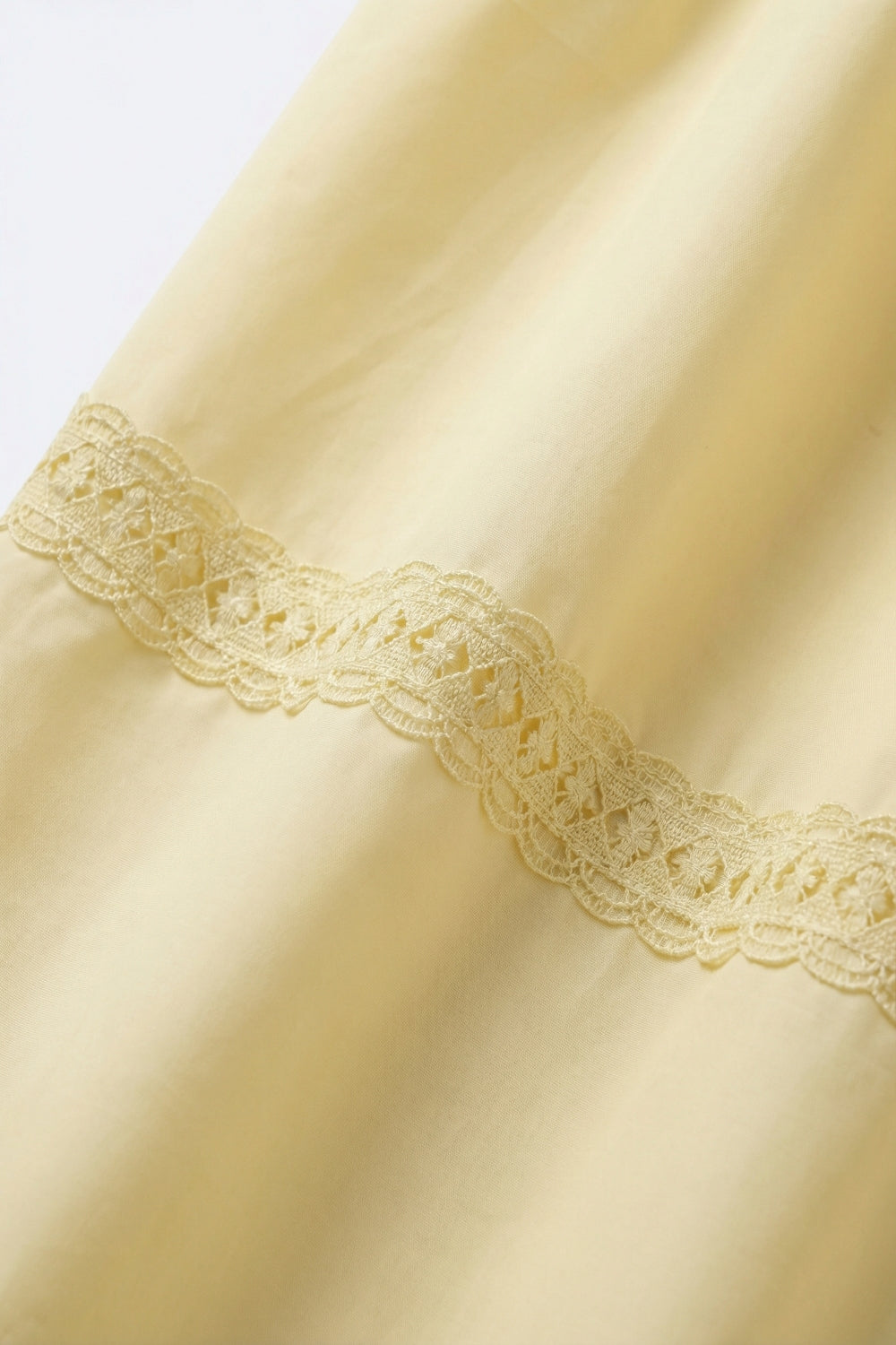 Gonna lunga in popeline giallo con dettaglio in pizzo