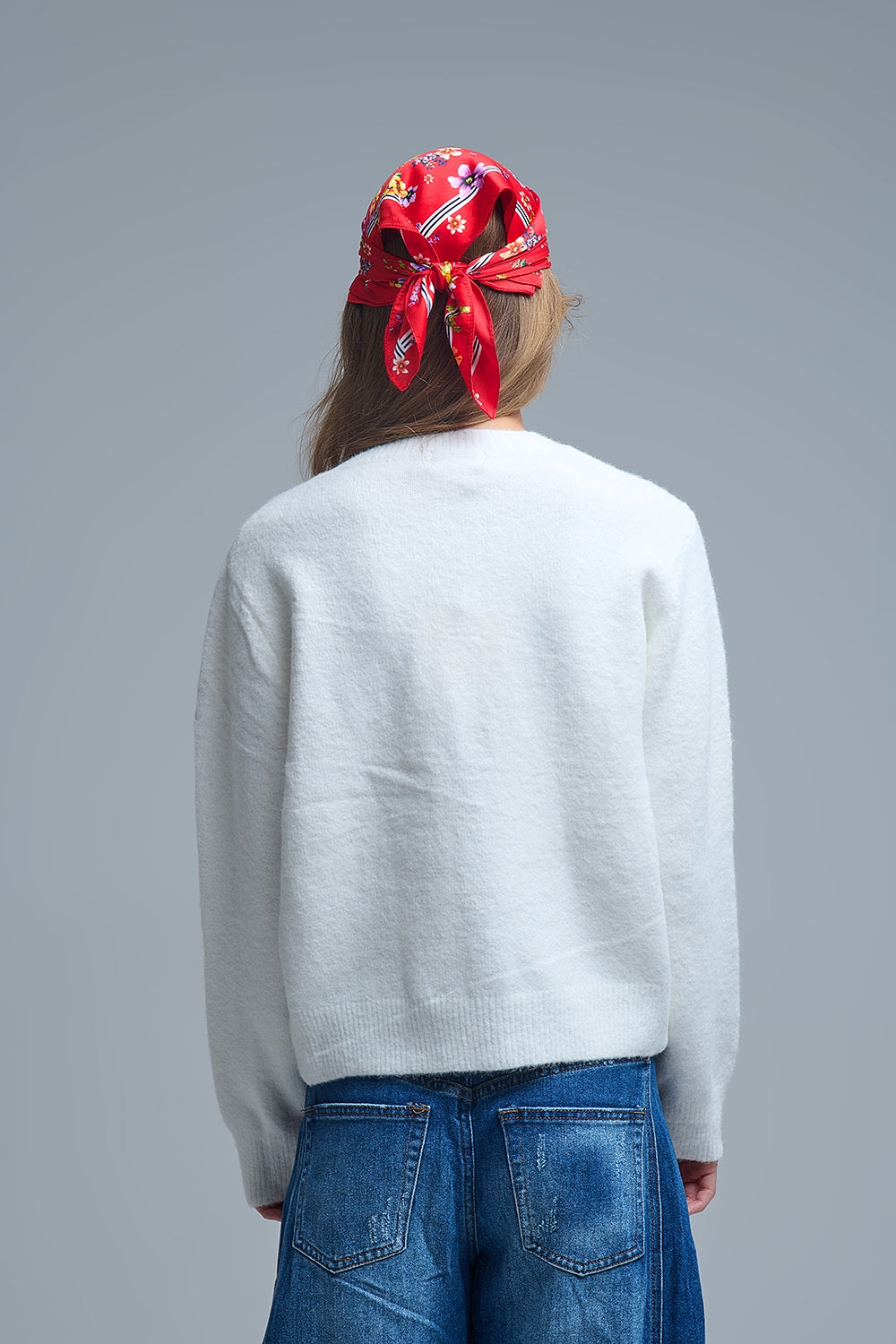 Incantevole cardigan bianco con bottoni a cuore