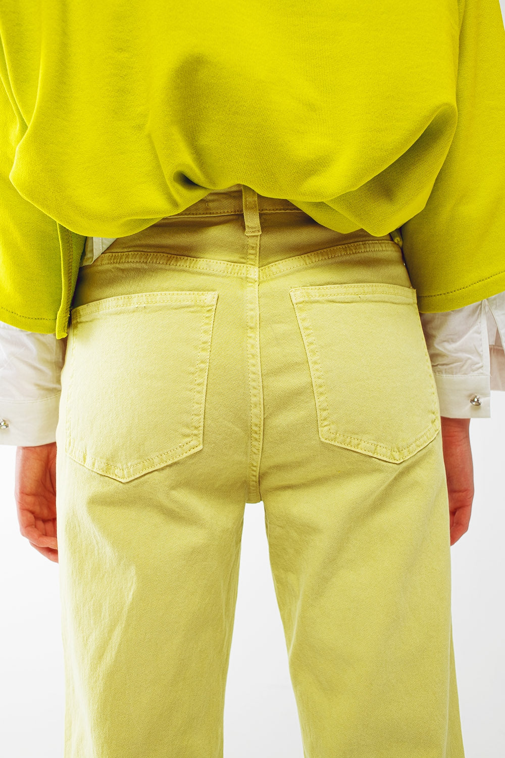 Jeans a gamba dritta con orlo tagliato in verde lime