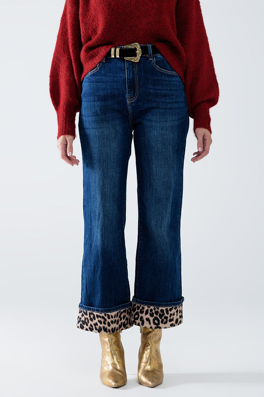 Jeans a gamba larga con striscia leopardata in basso