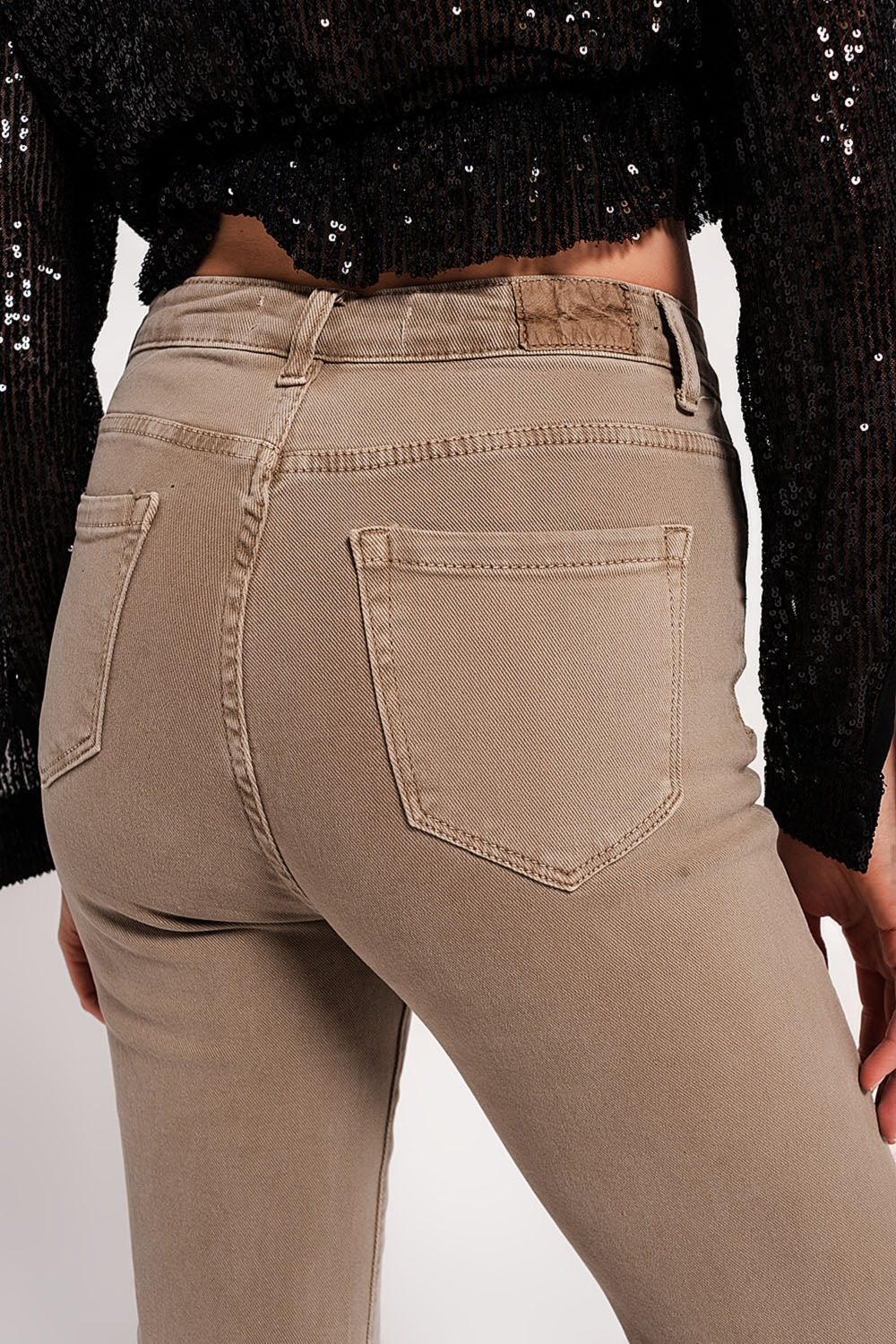 Jeans a zampa color beige