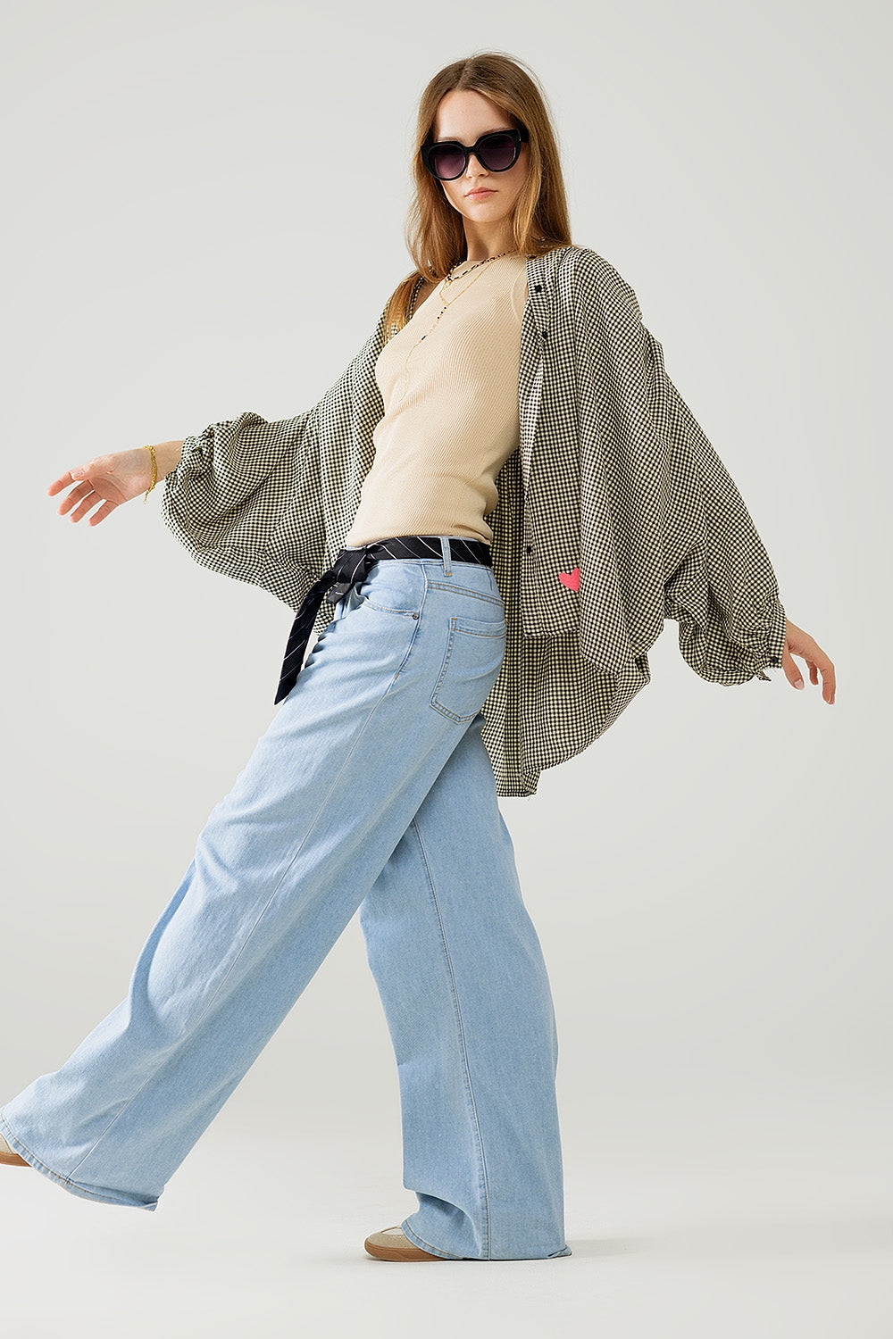 Jeans blu chiaro a gamba larga con pieghe