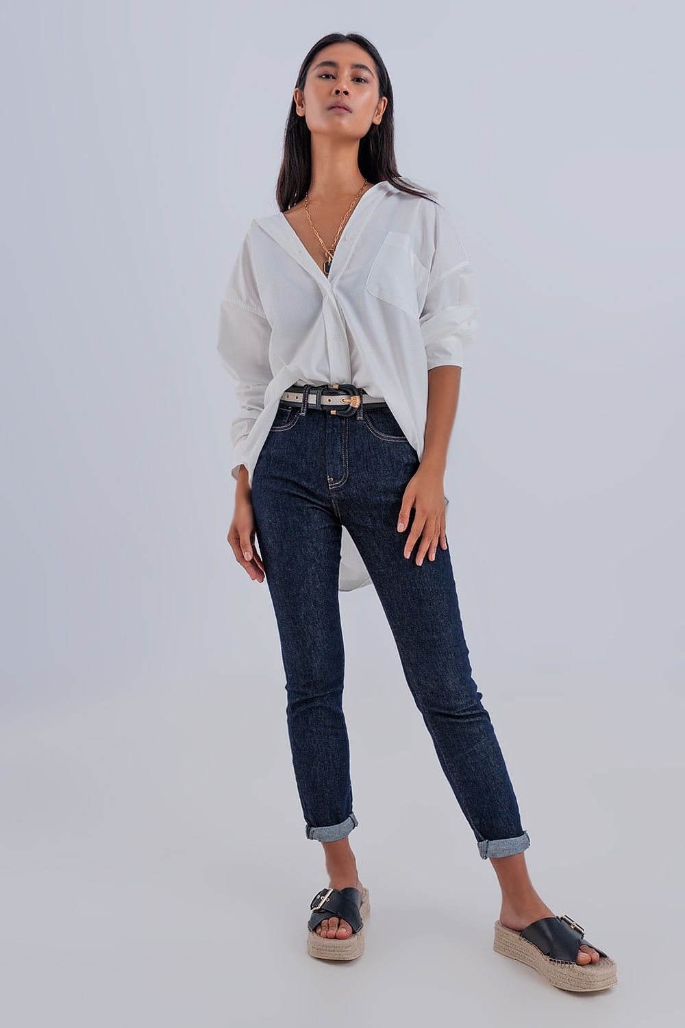 Jeans blu scuro basic a vita alta con cuciture a contrasto