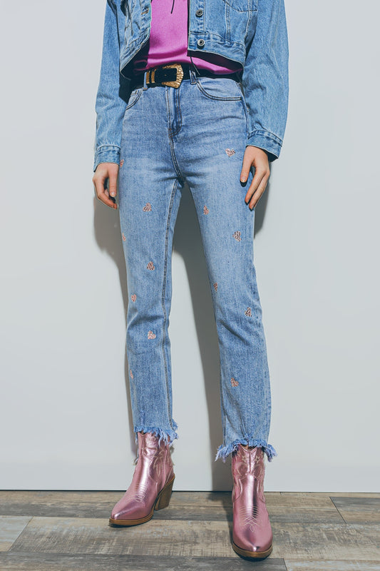 Q2 Jeans con cuore impreziosito e orlo strappato in lavaggio medio