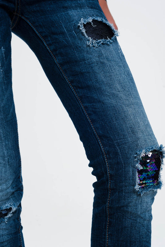 Q2 jeans con paillettes e strappi