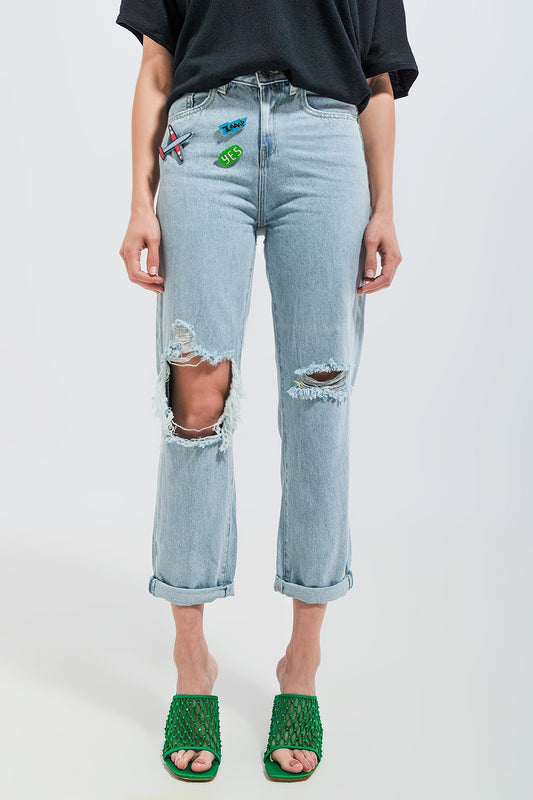 Q2 Jeans con strappi e toppe lavaggio chiaro
