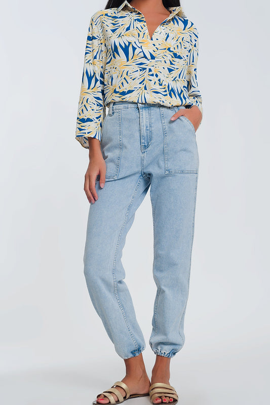 Q2 Jeans con tasche ovoidali azzurri