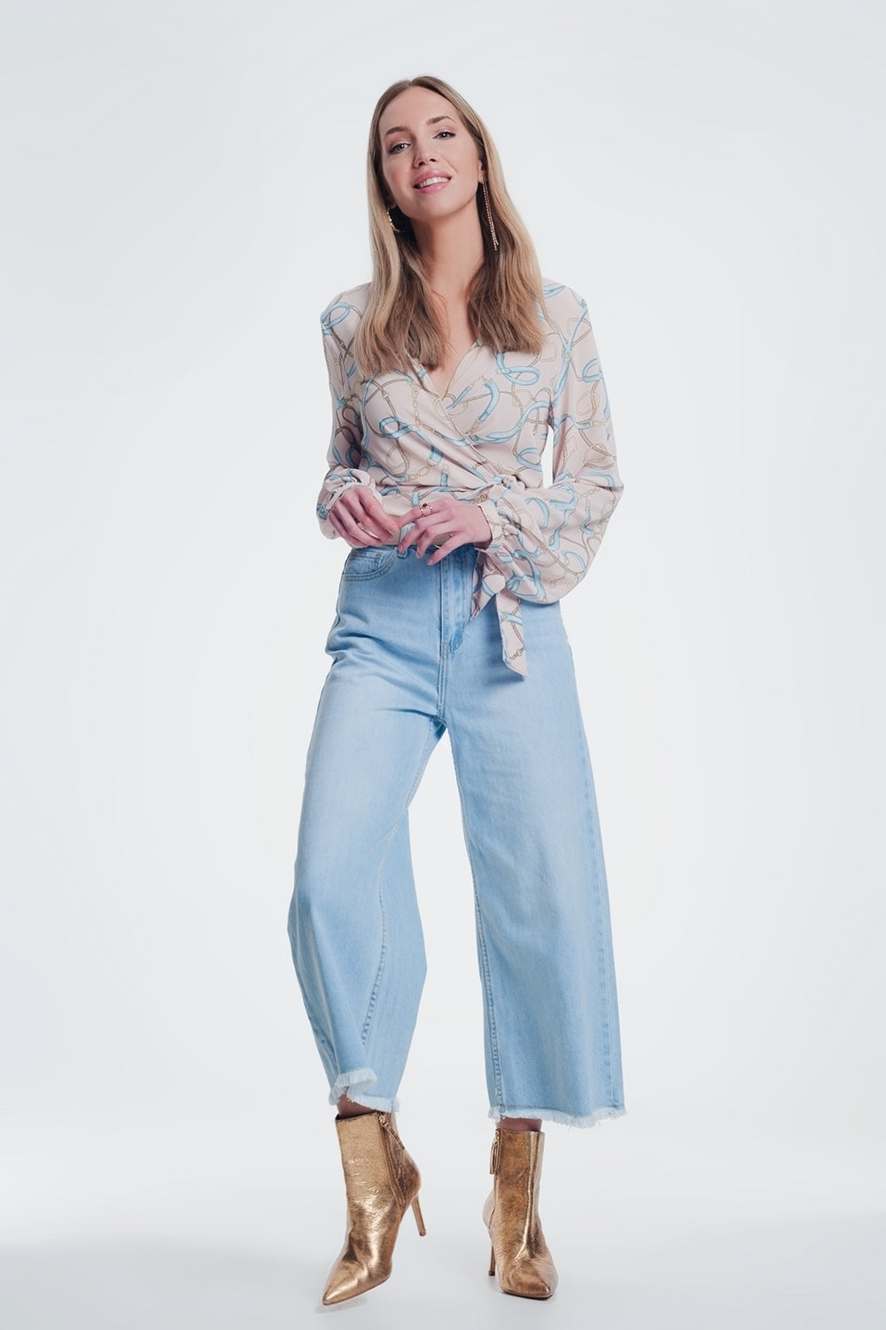 Jeans culotte con orlo strappato