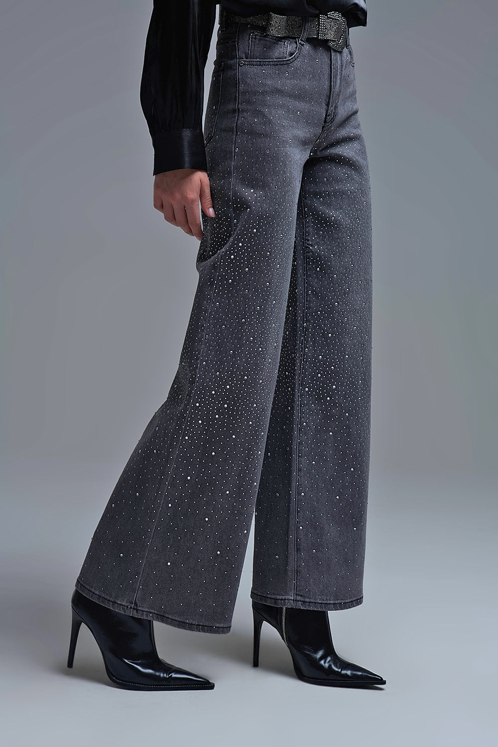 Jeans neri con strass a gamba larga