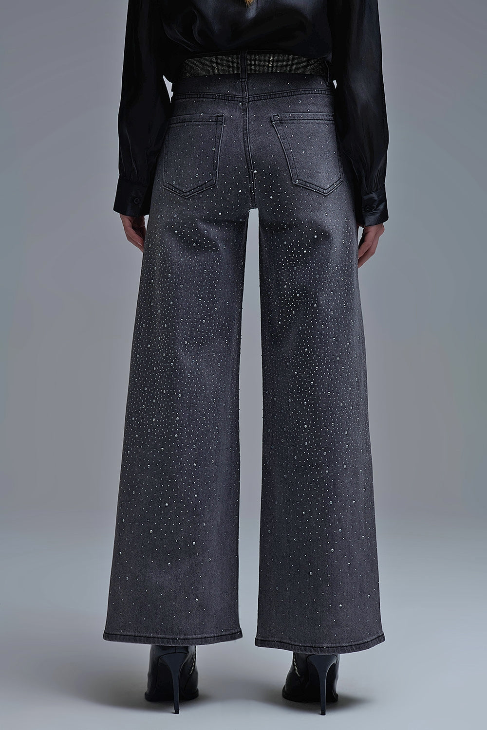 Jeans neri con strass a gamba larga