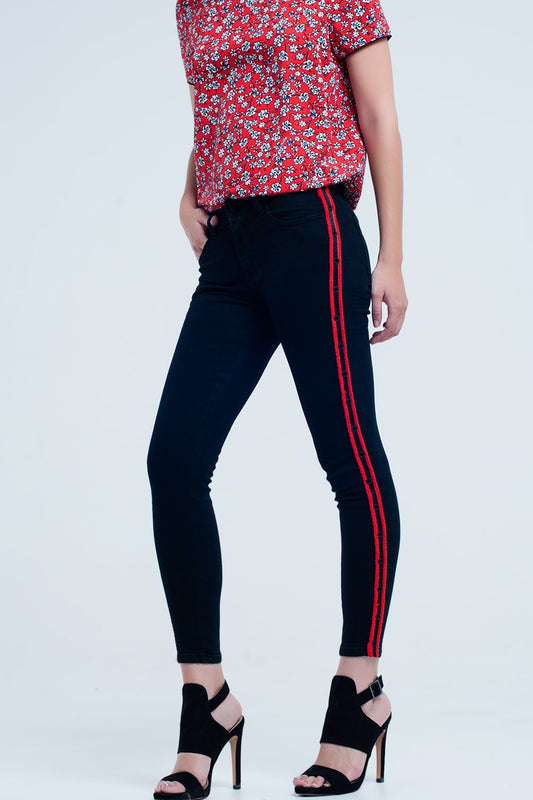 Q2 Jeans neri super skinny con occhielli laterali