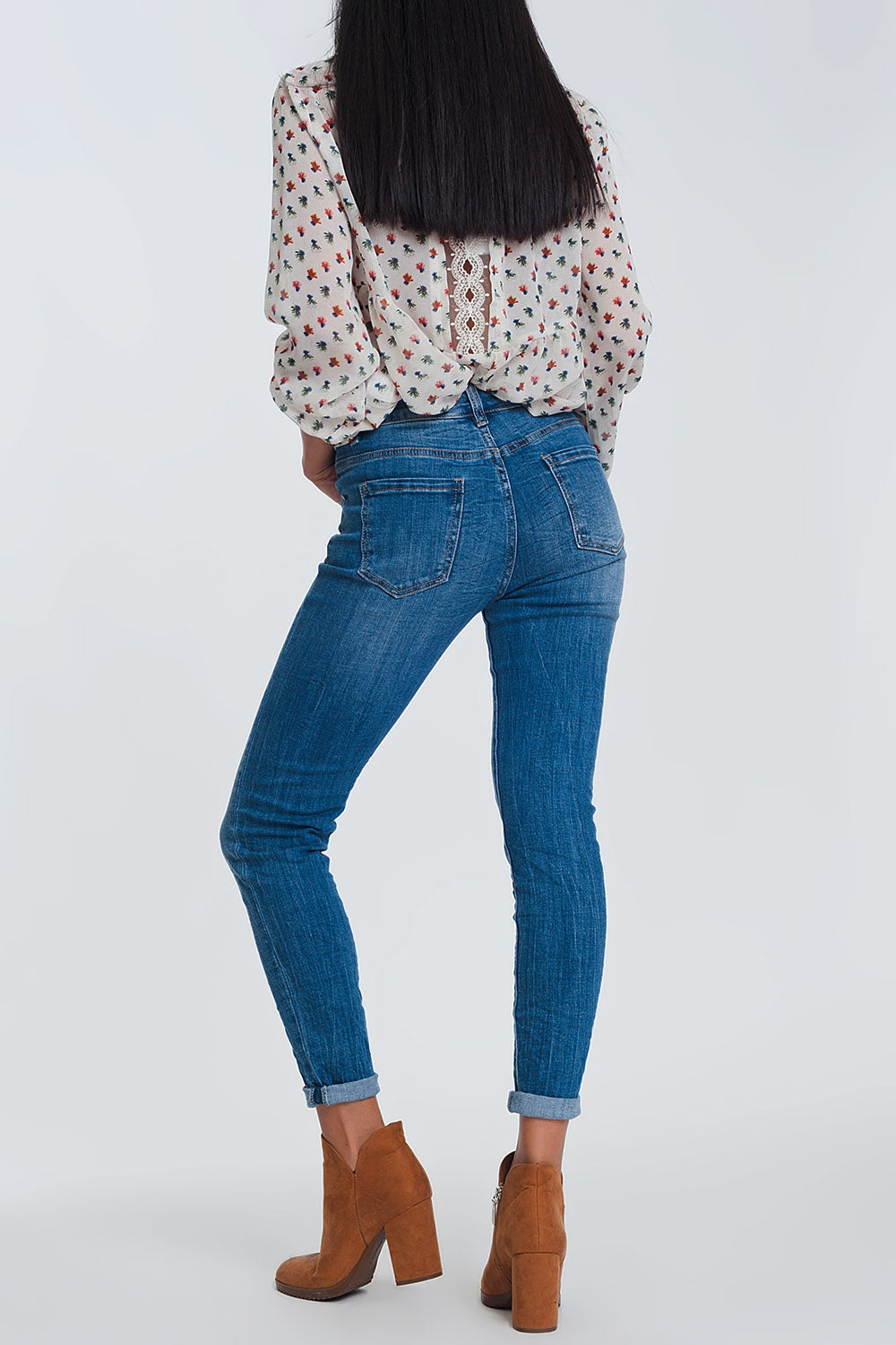 Jeans skinny a vita meta azzurri