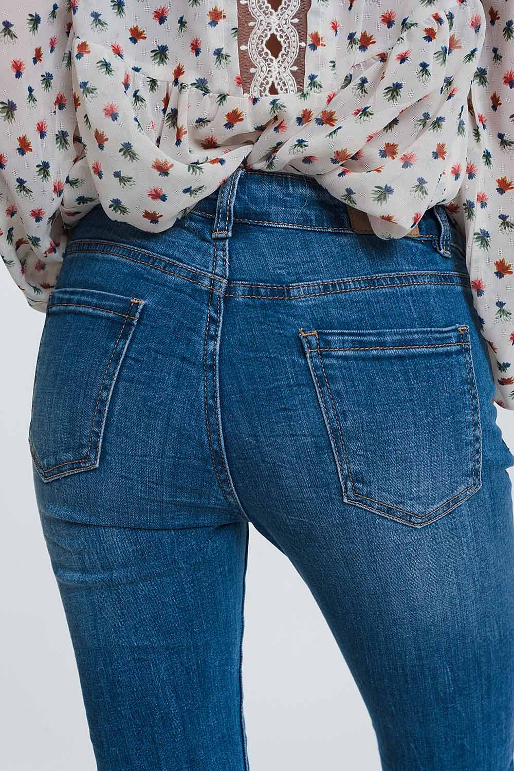 Jeans skinny a vita meta azzurri