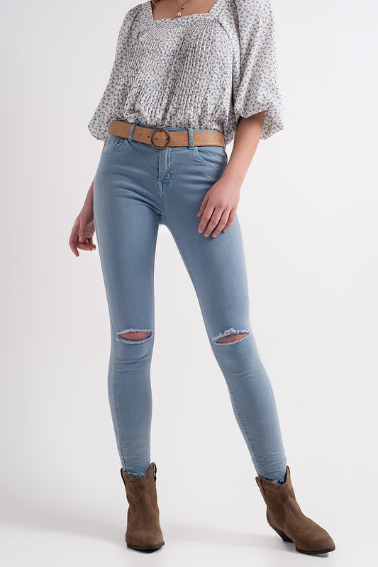 Q2 Jeans skinny blu con strappi sulle ginocchia