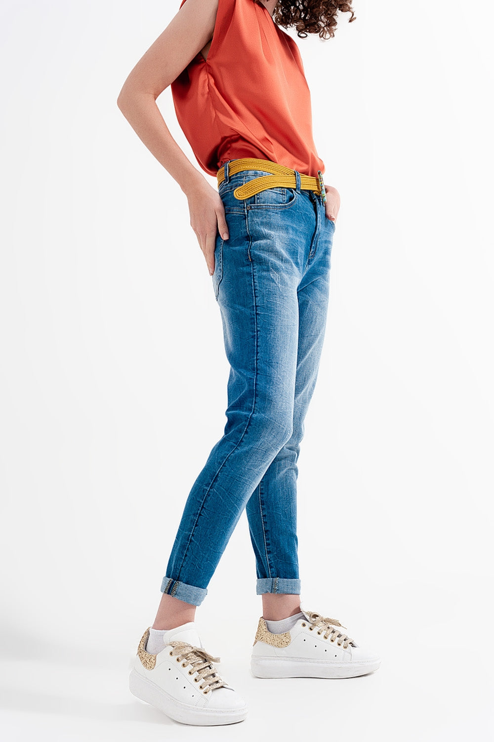 Jeans skinny blu lavaggio scuro con abrasioni