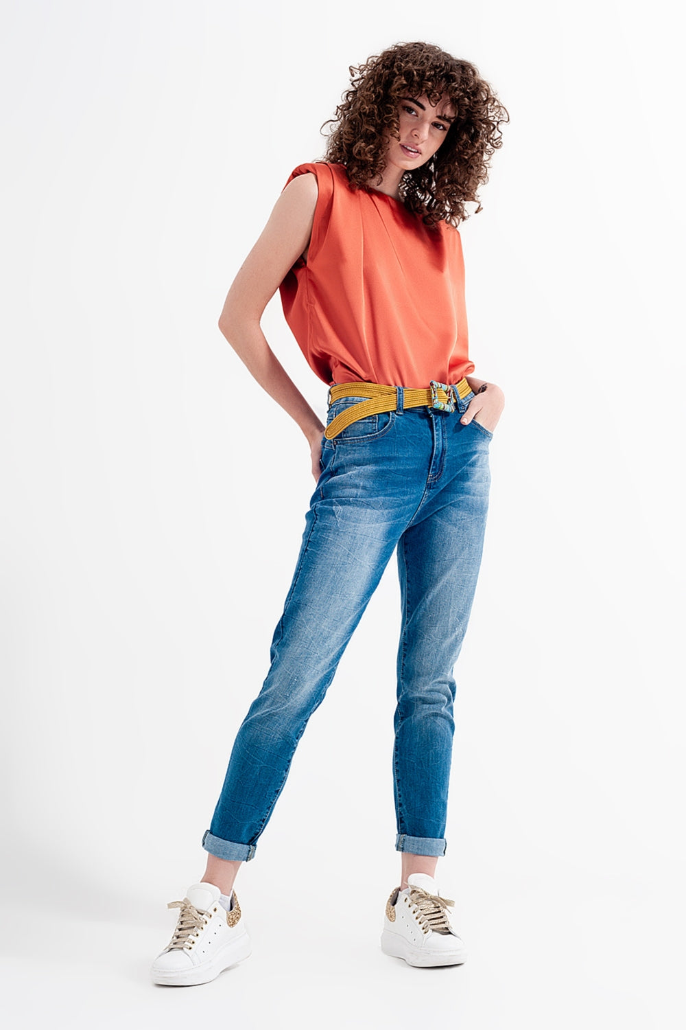 Jeans skinny blu lavaggio scuro con abrasioni