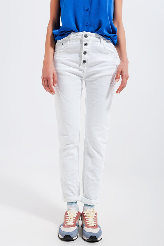 Q2 Jeans skinny con bottoni a vista e lavaggio bianco