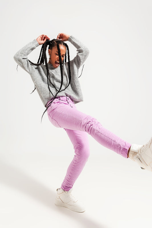 Q2 Jeans skinny con bottoni a vista e lavaggio rosa