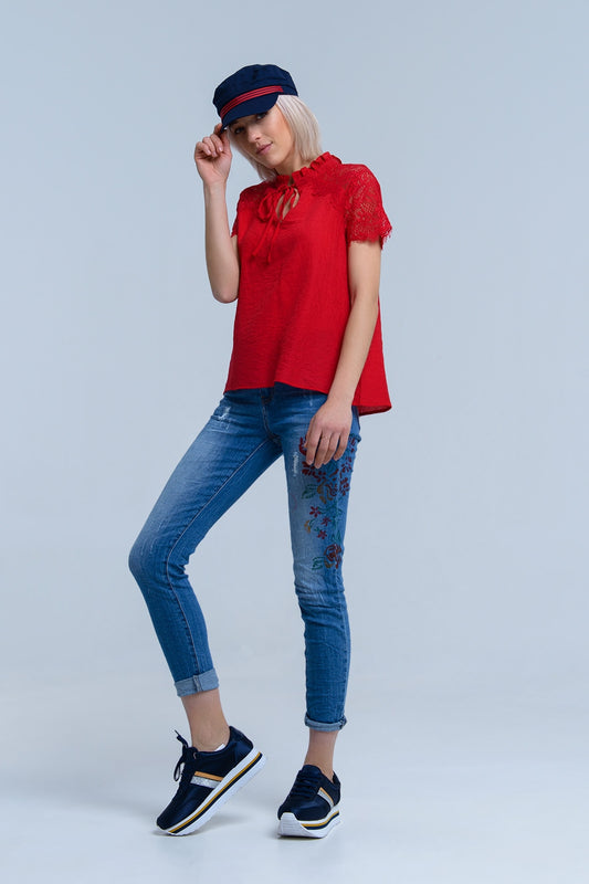Q2 Jeans skinny con fiori dipinti