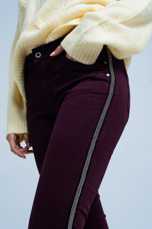 Q2 Jeans skinny con riga laterale metallizzata