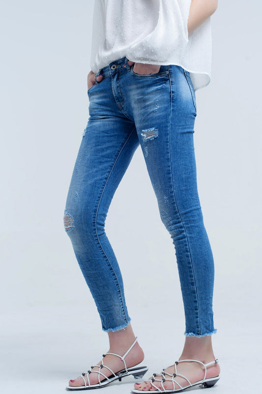 Q2 Jeans skinny in lavaggio medio con strappi