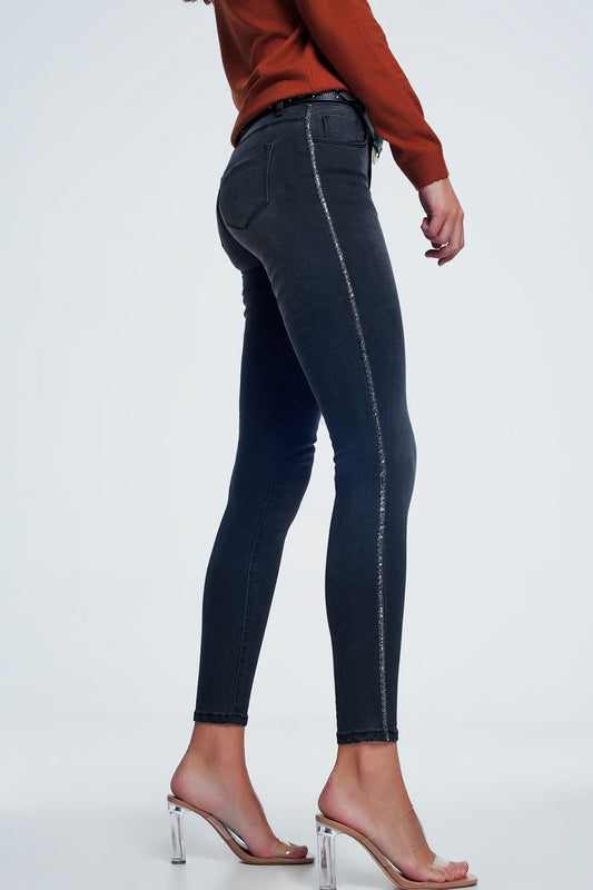 Q2 Jeans skinny neri con decorazione laterale