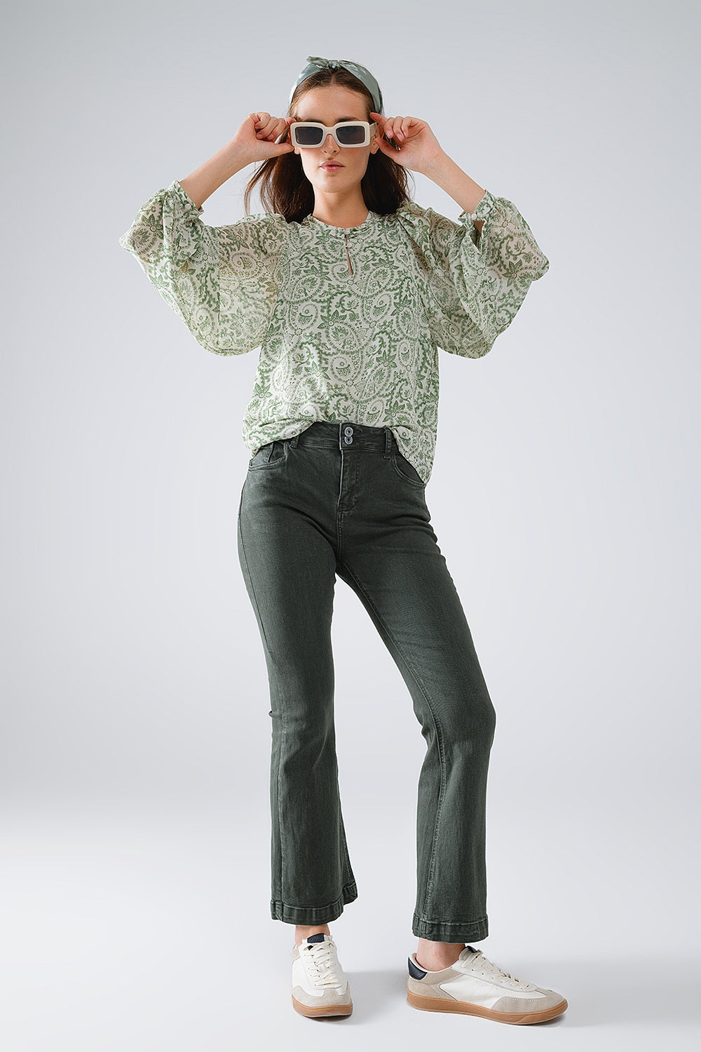 Jeans skinny svasati con doppio bottone in kaki