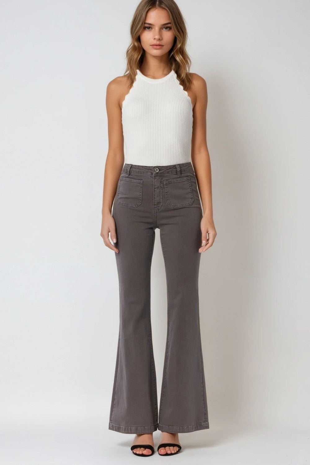 Jeans skinny svasati grigio scuro con dettaglio tasca frontale