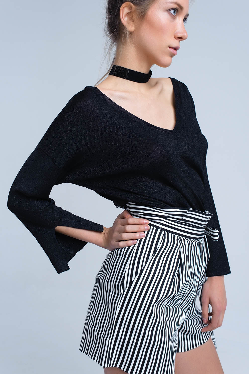 Maglia nera con dettagli in lurex oro