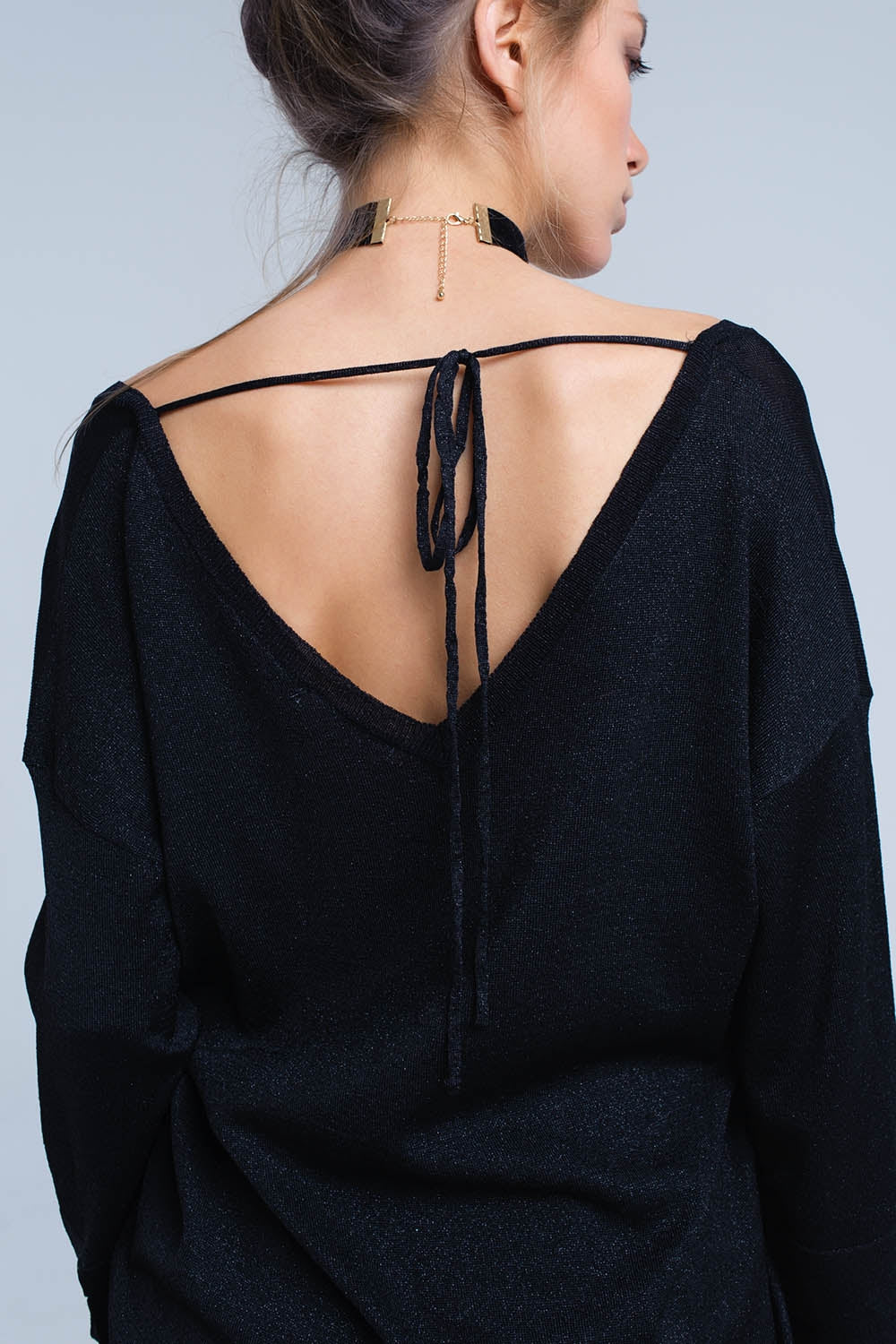 Maglia nera con dettagli in lurex oro