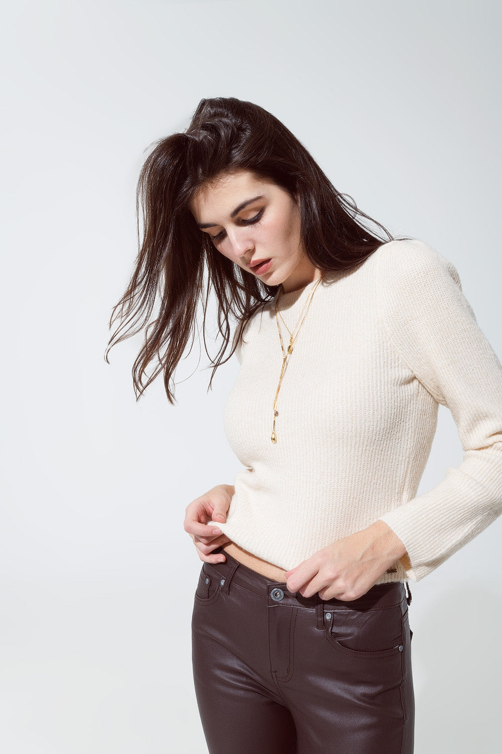 Maglione a coste con scollo rotondo in color crema