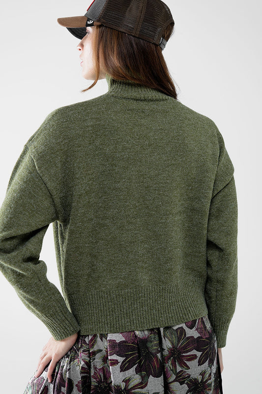 maglione a maglia grossa verde con dolcevita