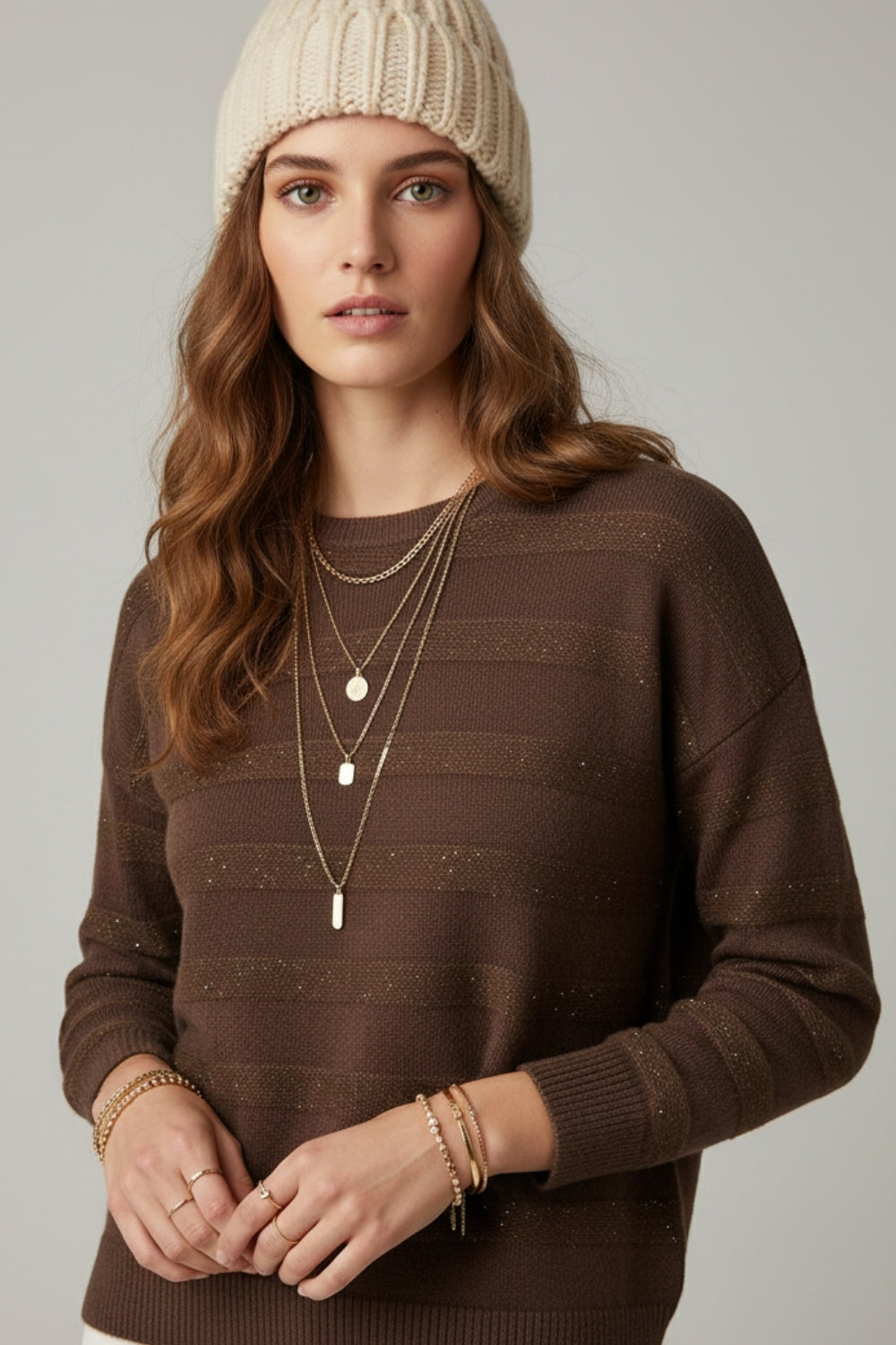 Maglione a righe marrone con dettaglio in paillettes