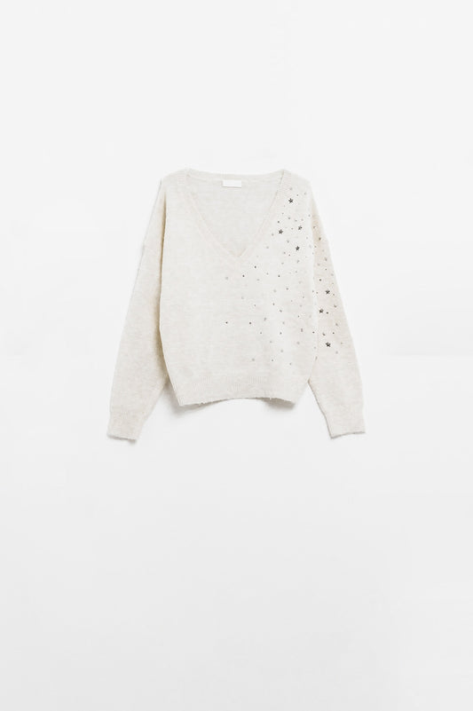 Maglione con scollo a V impreziosito da stelle metalliche