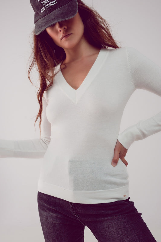 Q2 Maglione crema in maglia fine con scollo a V