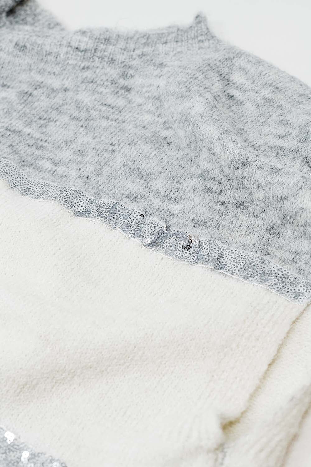 Maglione grigio senza maniche con dettagli in paillettes