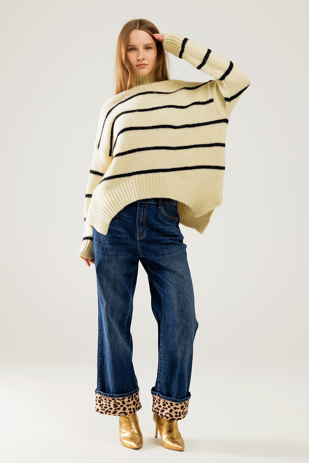 Maglione oversize color crema con righe nere