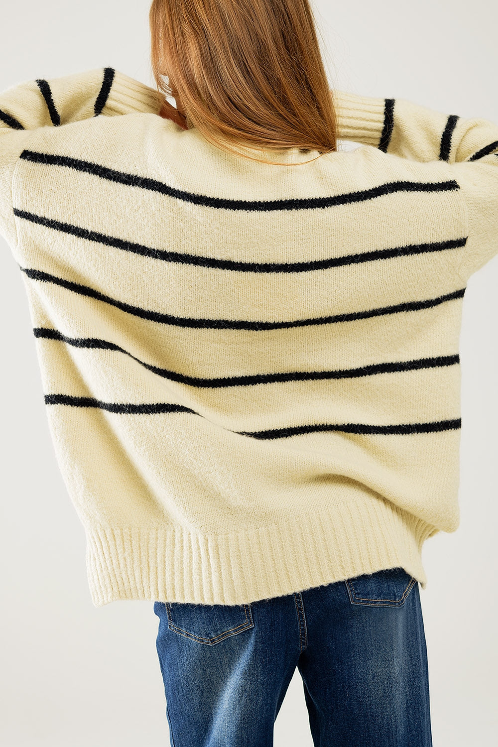 Maglione oversize color crema con righe nere