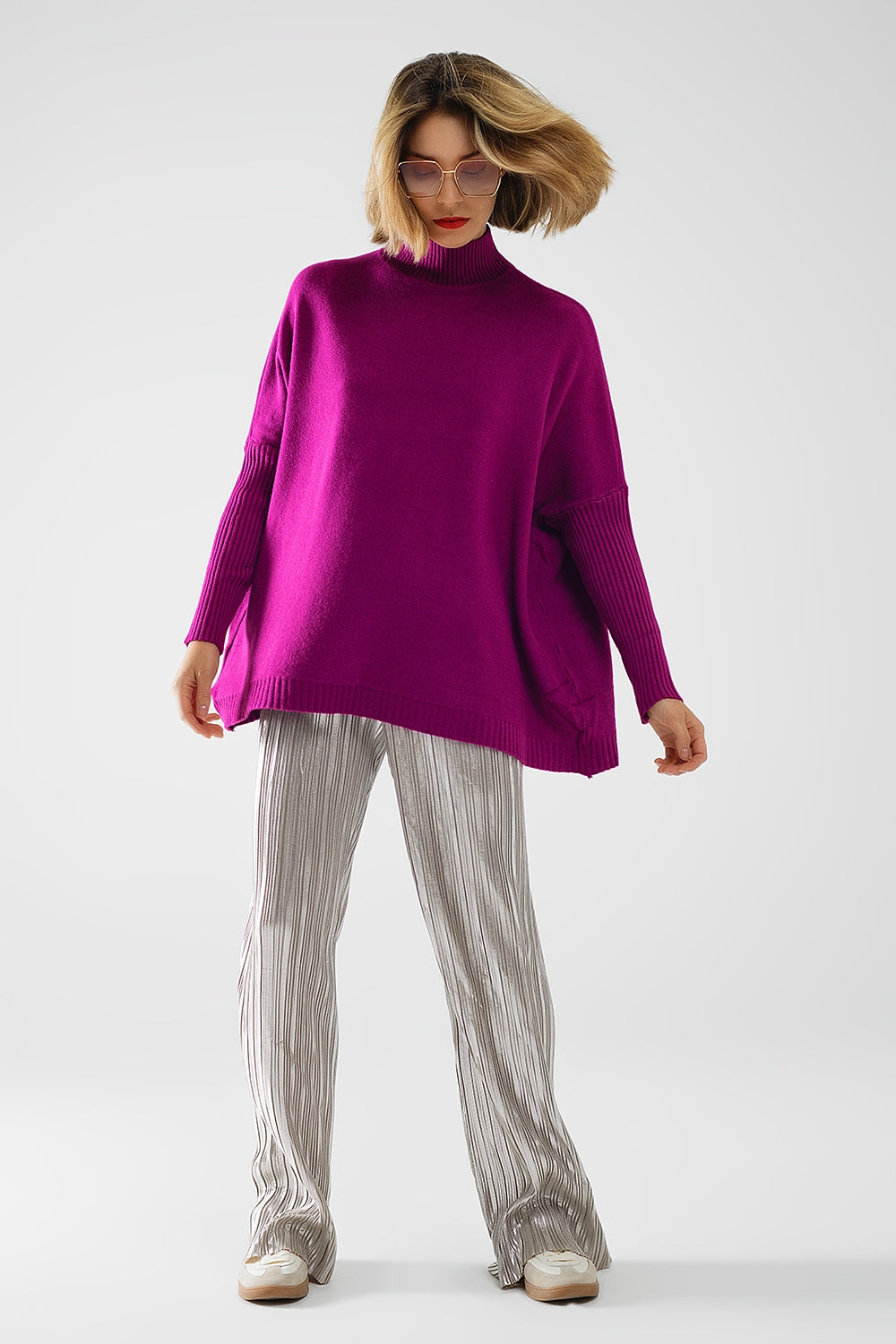 maglione oversize fucsia morbido con maniche a costine