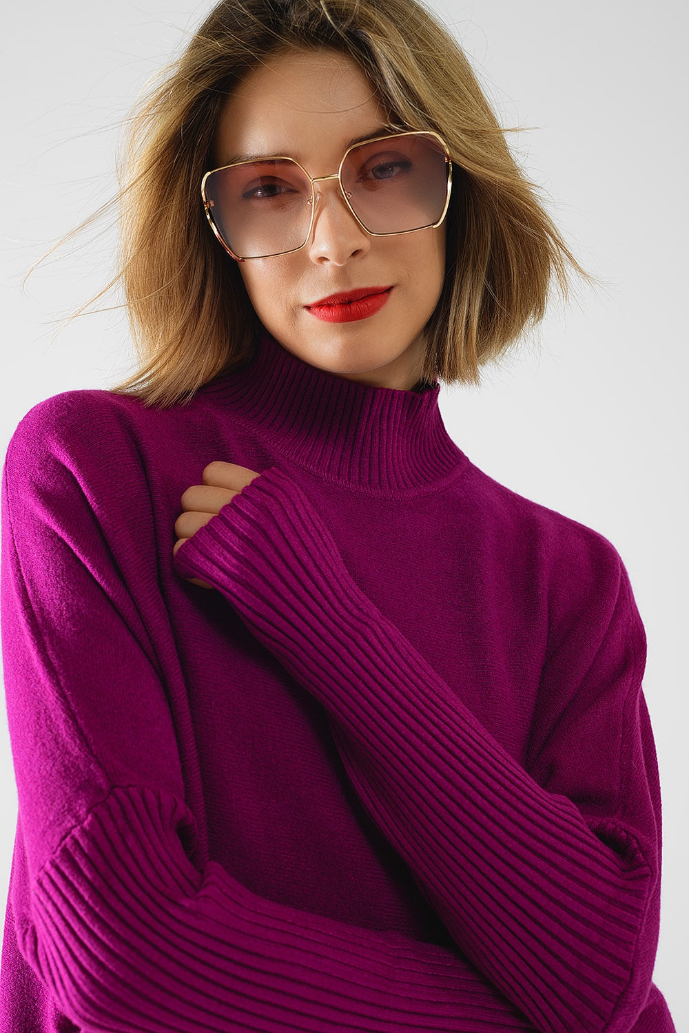 maglione oversize fucsia morbido con maniche a costine