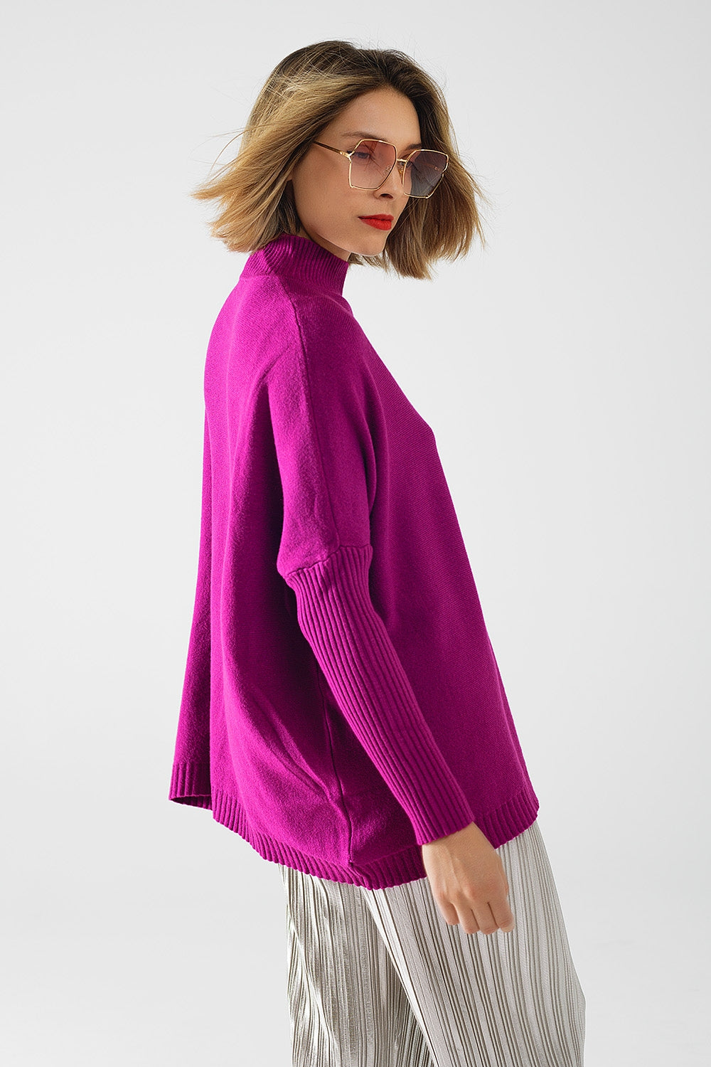 maglione oversize fucsia morbido con maniche a costine