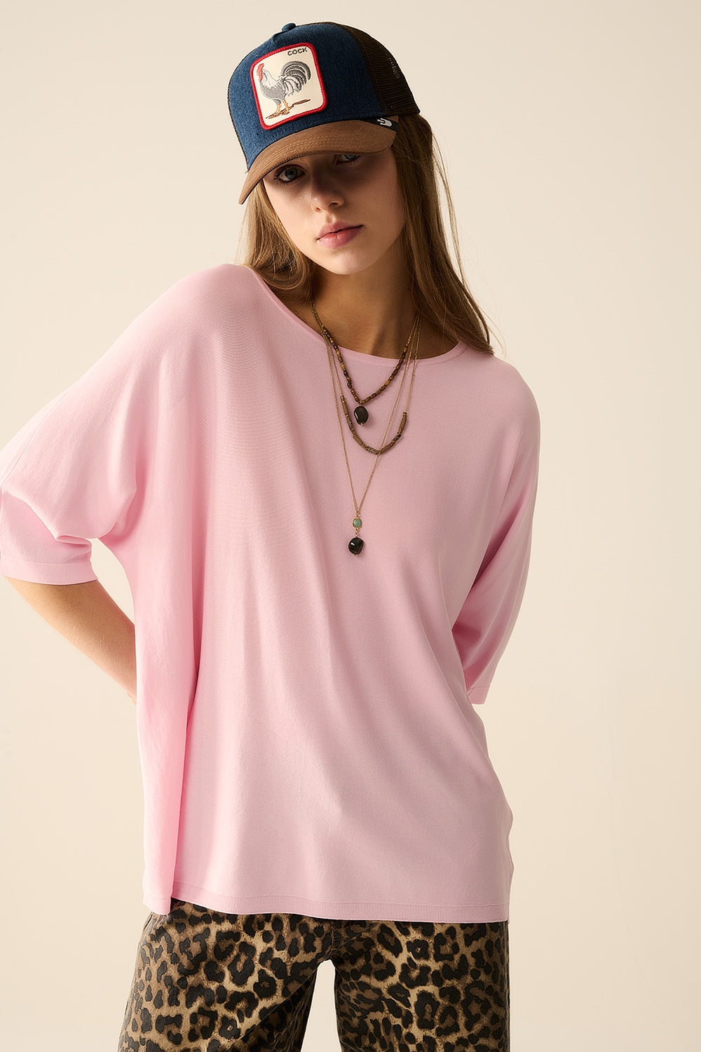 maglione oversize in rosa con maniche al gomito