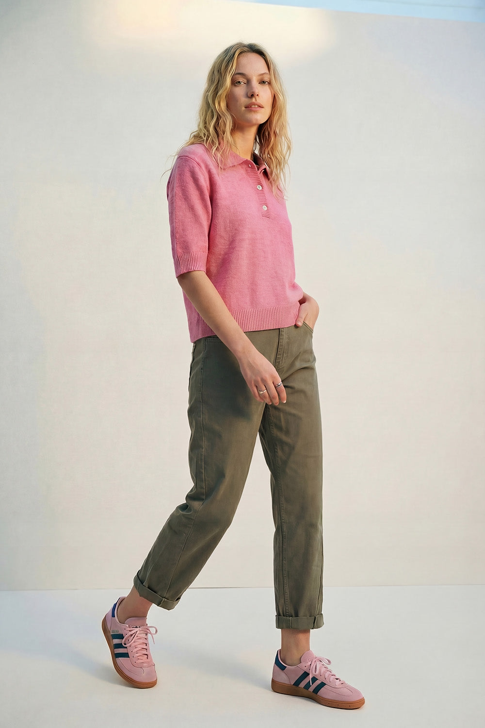 Maglione polo rosa a maglia morbida e soffice