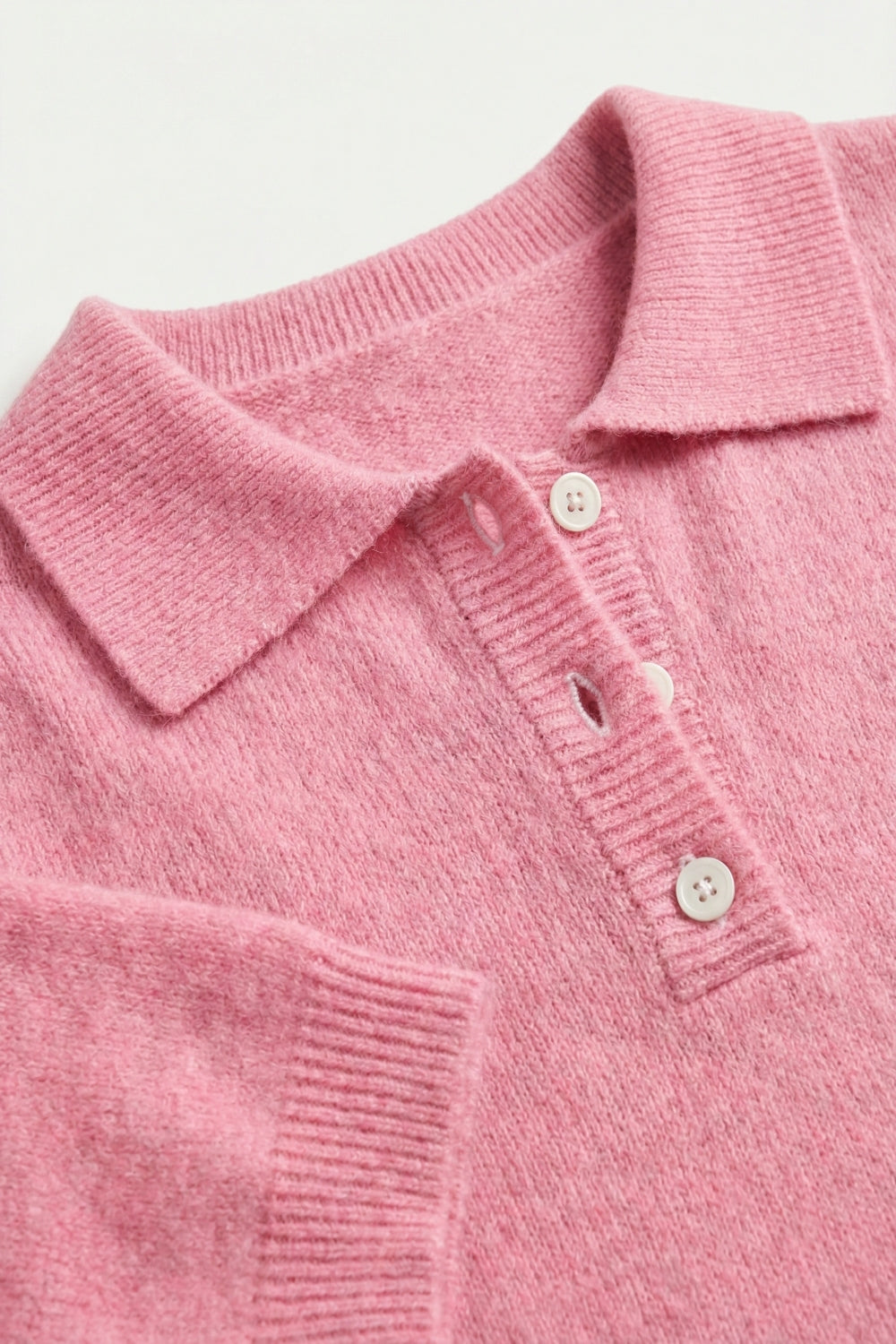 Maglione polo rosa a maglia morbida e soffice