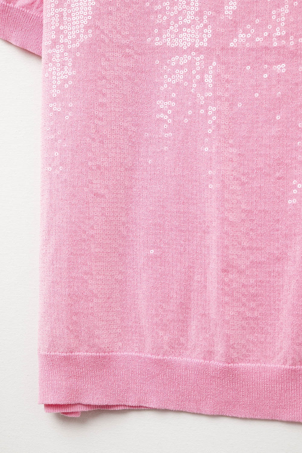 Maglione rosa con paillettes e girocollo