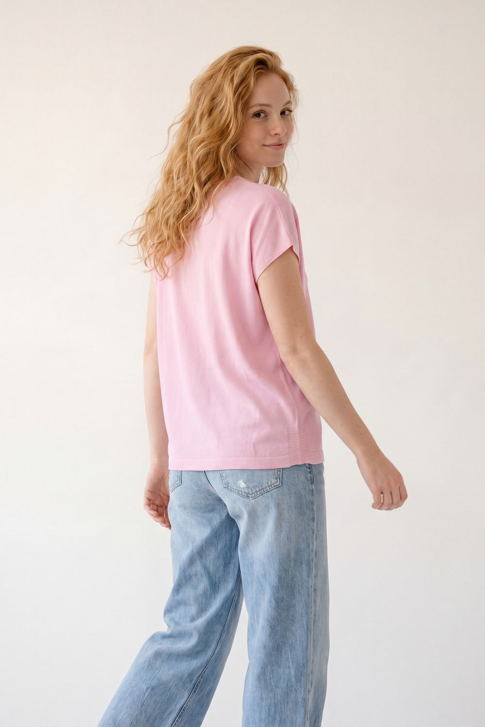 Maglione rosa con scollo a V e vestibilità rilassata