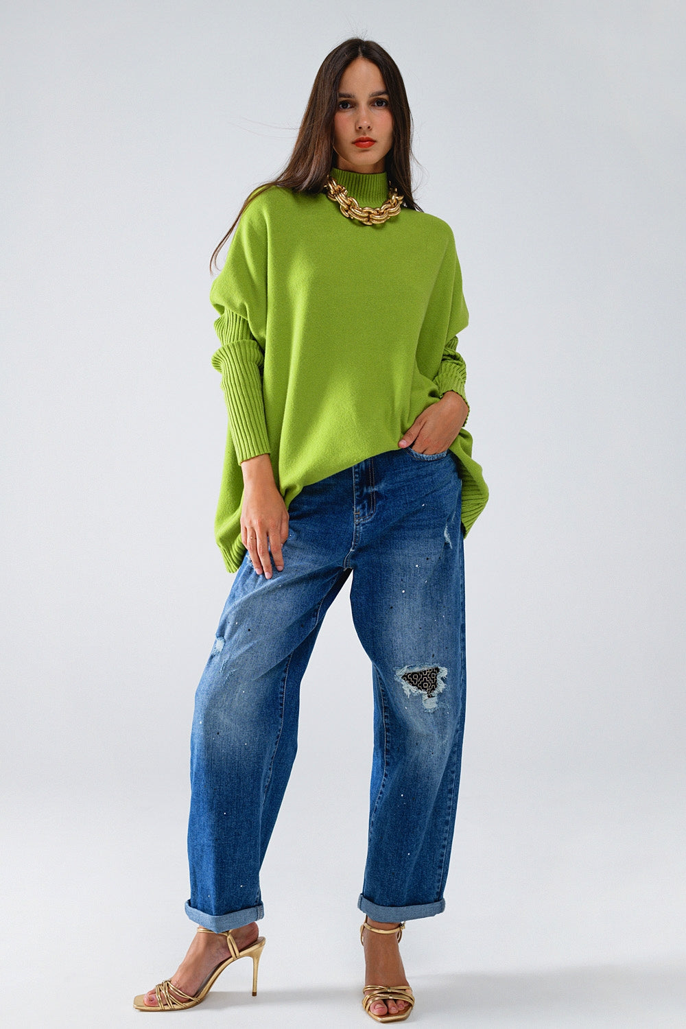 Maglione verde oversized e accogliente con maniche a costine