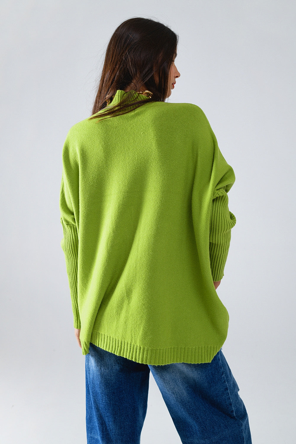 Maglione verde oversized e accogliente con maniche a costine